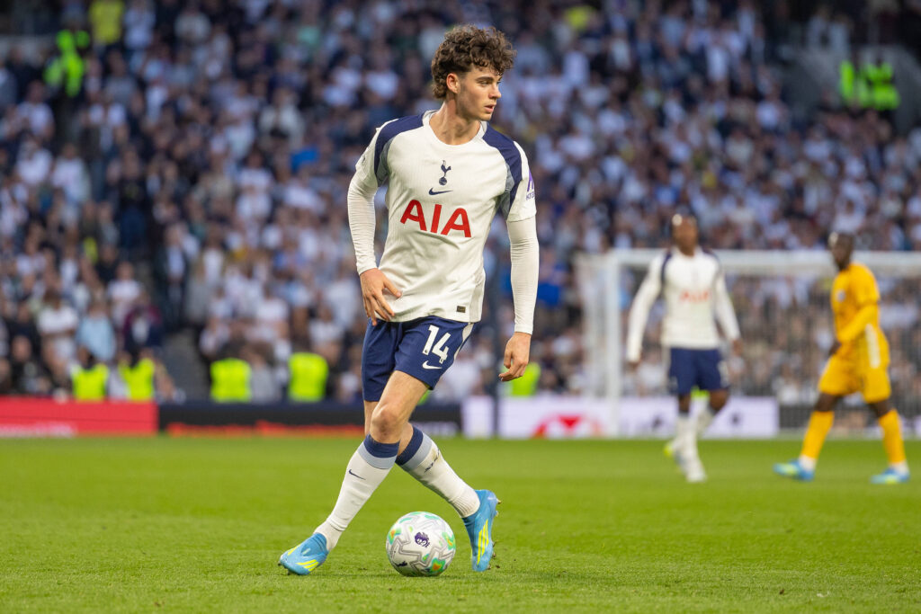 Djed Spence in action for Tottenham amid Everton transfer interest and World Cup rise